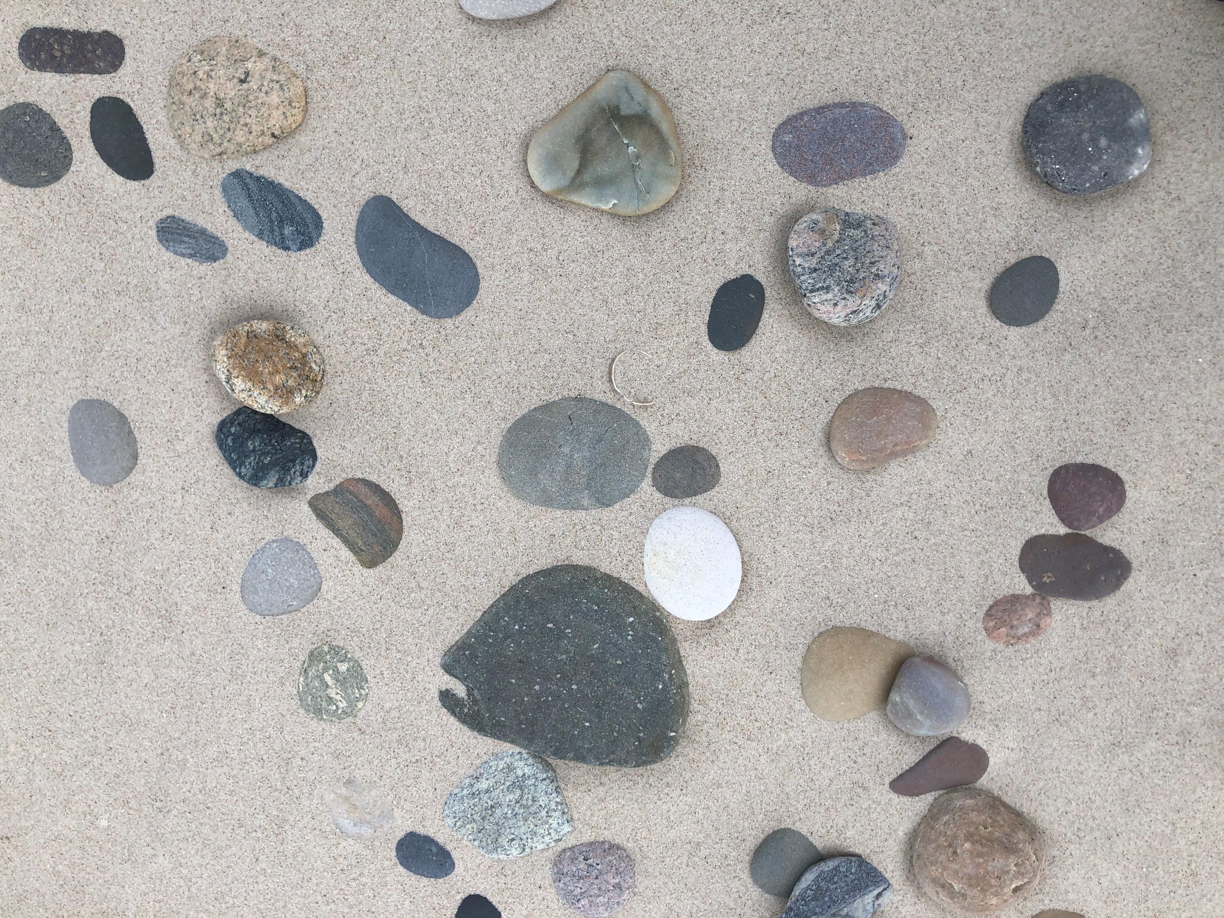 Photo of stones on a beach by Maj Thimm Carlsen