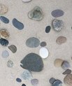 Photo of stones on a beach by Maj Thimm Carlsen